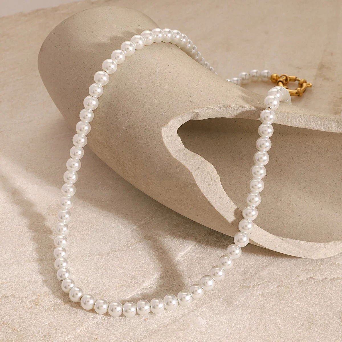 Modern pearl strand necklace with 18k gold stainless steel hardware