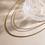 Tarnish-free ocean-proof Third Harmony gold necklace with extender chain.