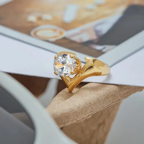 Waterproof Aurora gold ring with a bold V-shape architectural band design.
