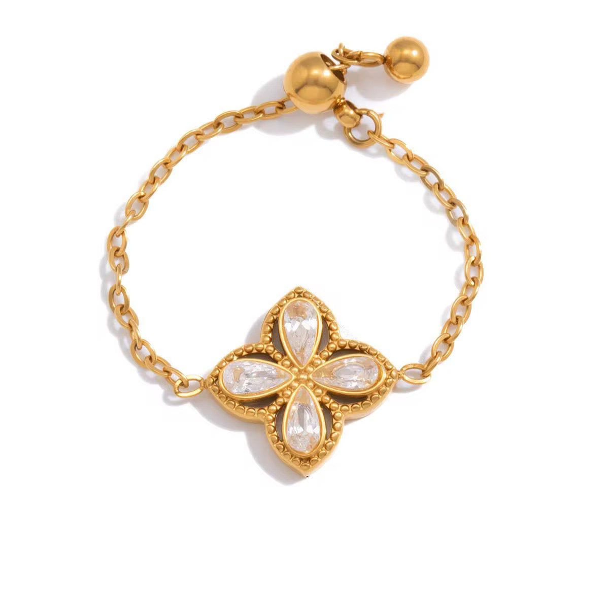 The Lyra Clover adjustable ring featuring 18k gold PVD plating and crystals.
