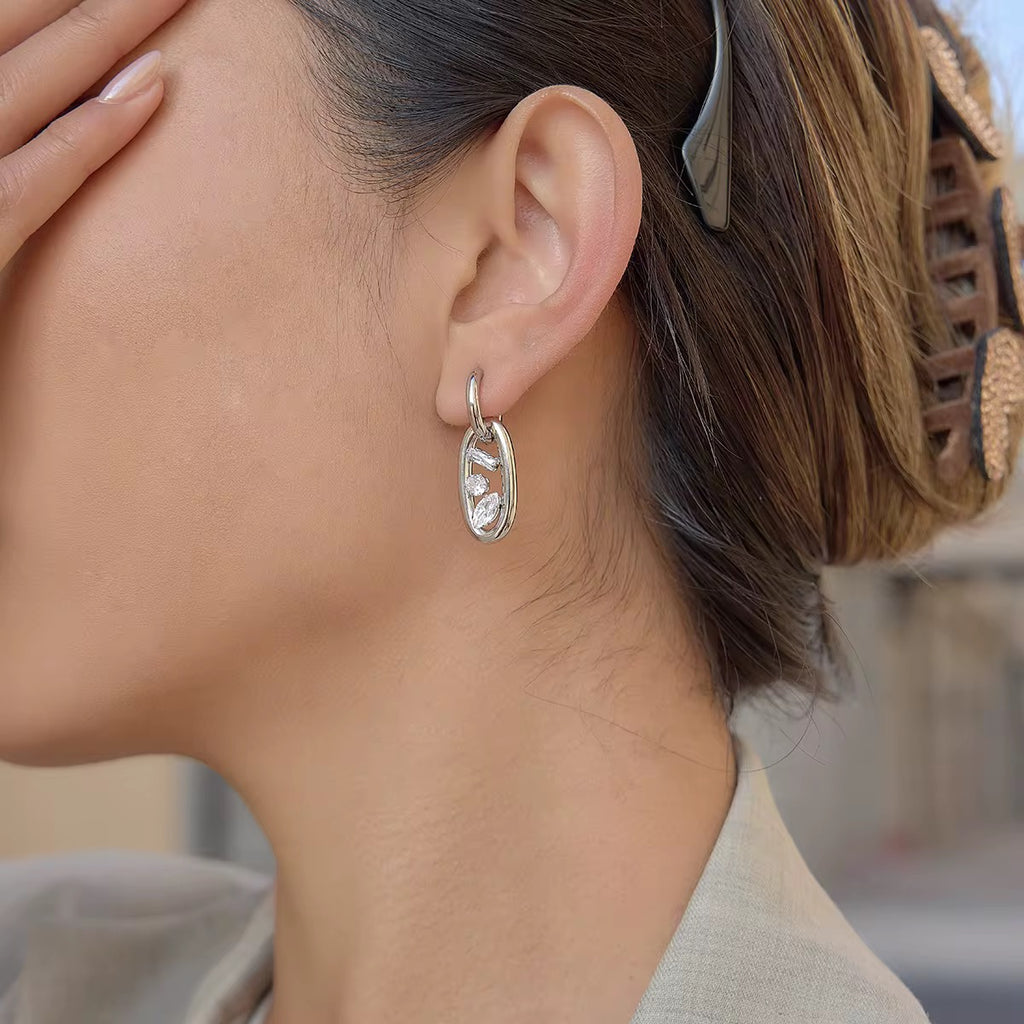 Tarnish-free ocean-proof interlocking crystal drop earrings safe for beach wear.