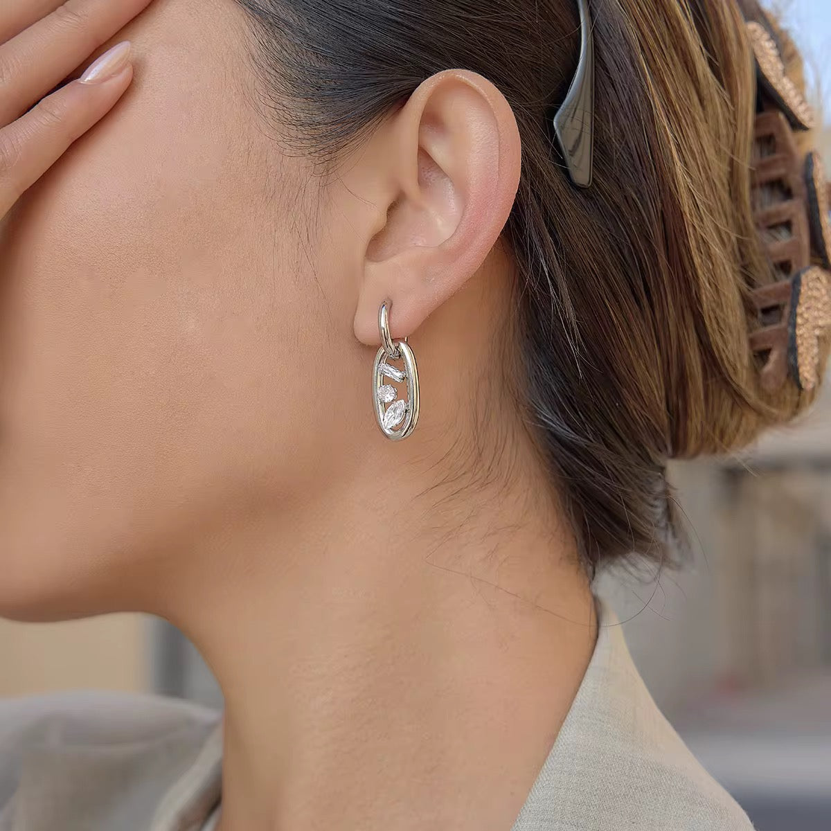 Tarnish-free ocean-proof interlocking crystal drop earrings safe for beach wear.