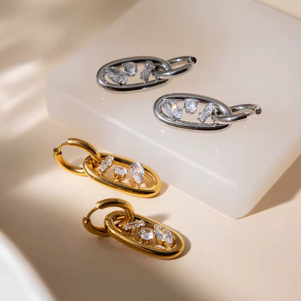 Silver interlocking geometric hoop earrings for women, 100% waterproof and tarnish-free.