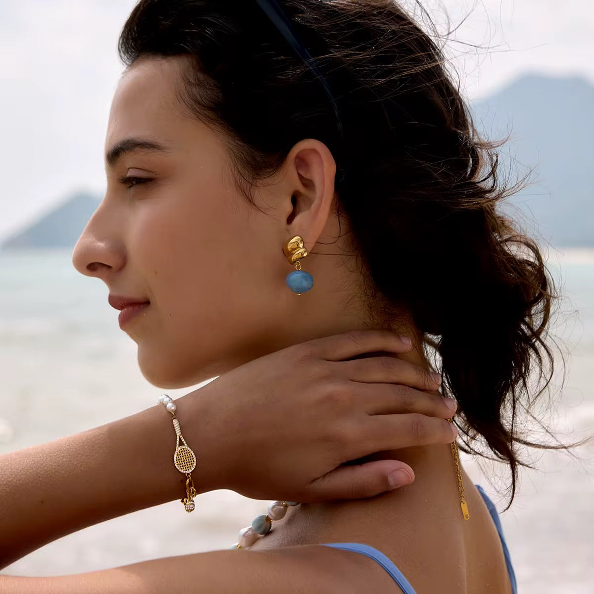 Sweat-proof 18k gold jewelry perfect for the gym, intense workouts, and active lifestyles.