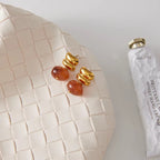 Non-tarnish 18k gold natural stone earrings with a 1-year anti-tarnish warranty.