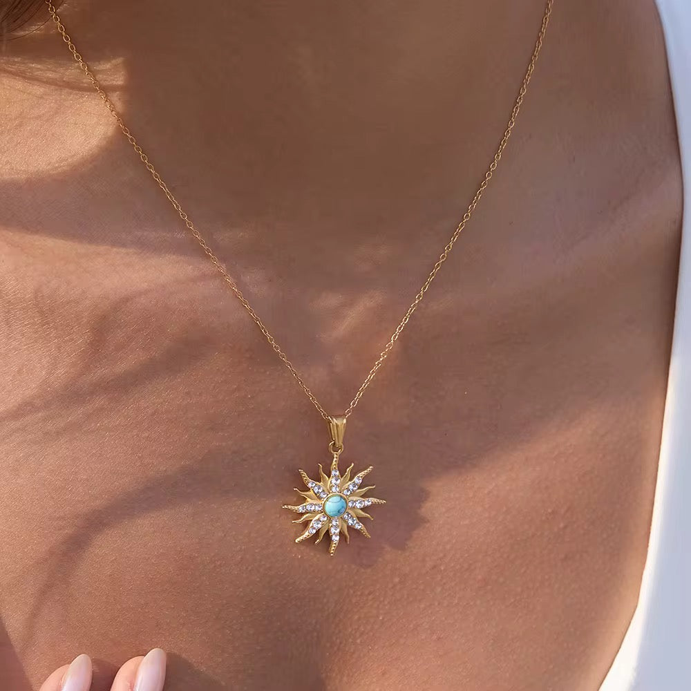 Hypoallergenic 18k gold plated stainless steel sunburst pendant for sensitive skin.