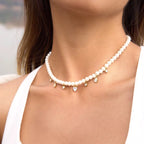 Hypoallergenic 18k gold plated stainless steel pearl jewelry safe for sensitive skin.