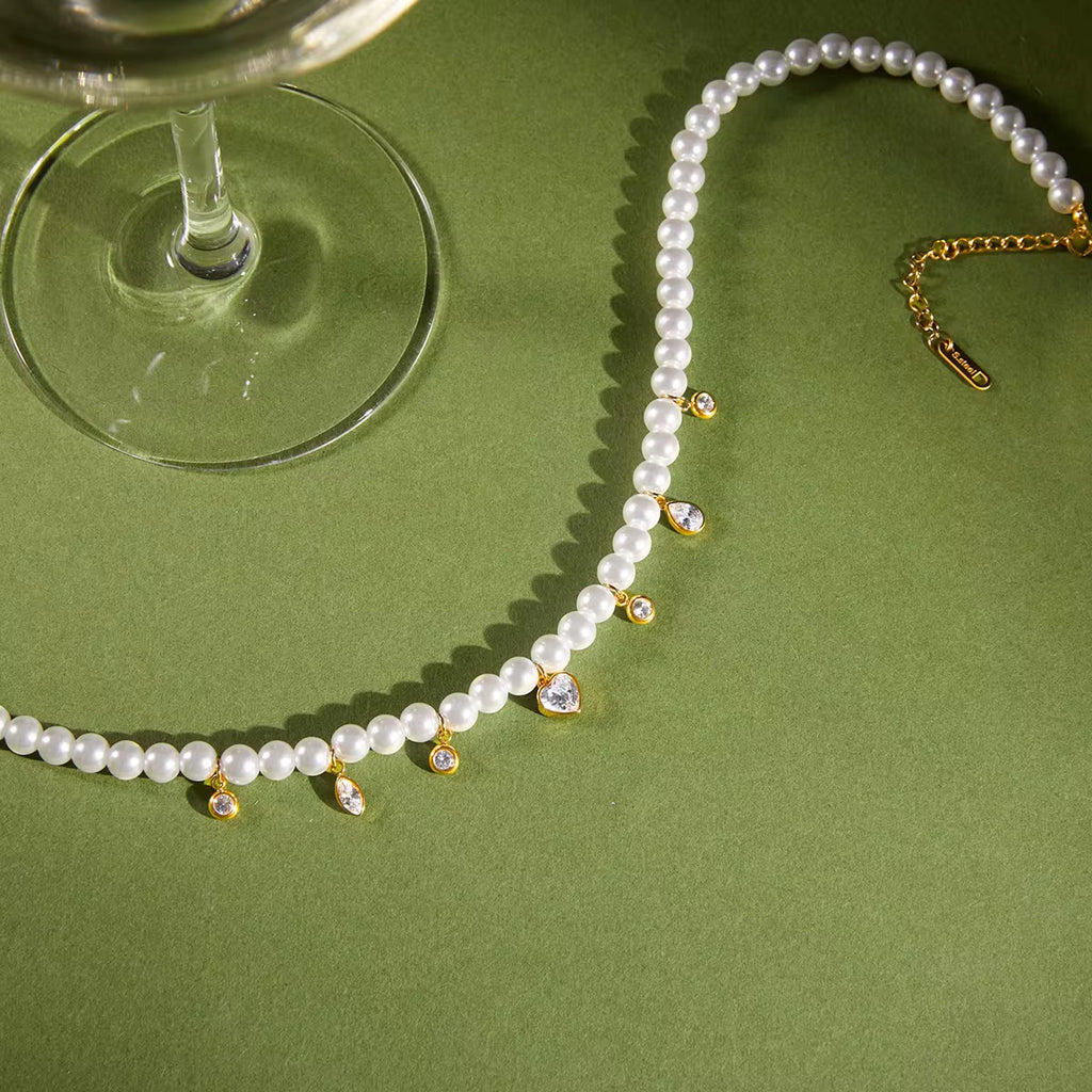 Technical drawing of Heart of Pearls showing 40cm length and 0.89cm heart pendant.