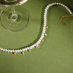 Technical drawing of Heart of Pearls showing 40cm length and 0.89cm heart pendant.