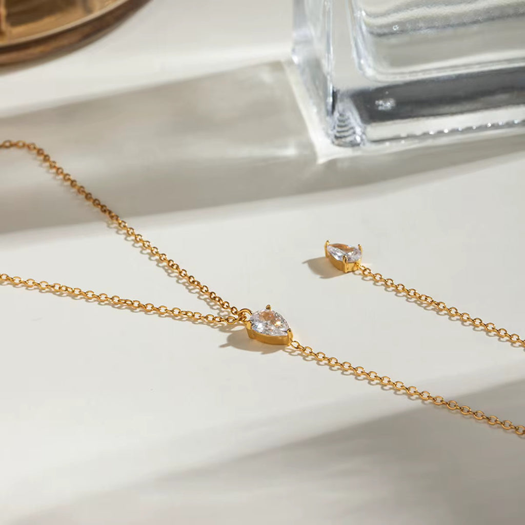Hypoallergenic 18k gold plated stainless steel lariat necklace for sensitive skin.