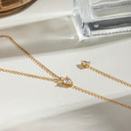 Hypoallergenic 18k gold plated stainless steel lariat necklace for sensitive skin.