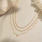 Hypoallergenic 18k gold plated stainless steel layered necklace for sensitive skin.