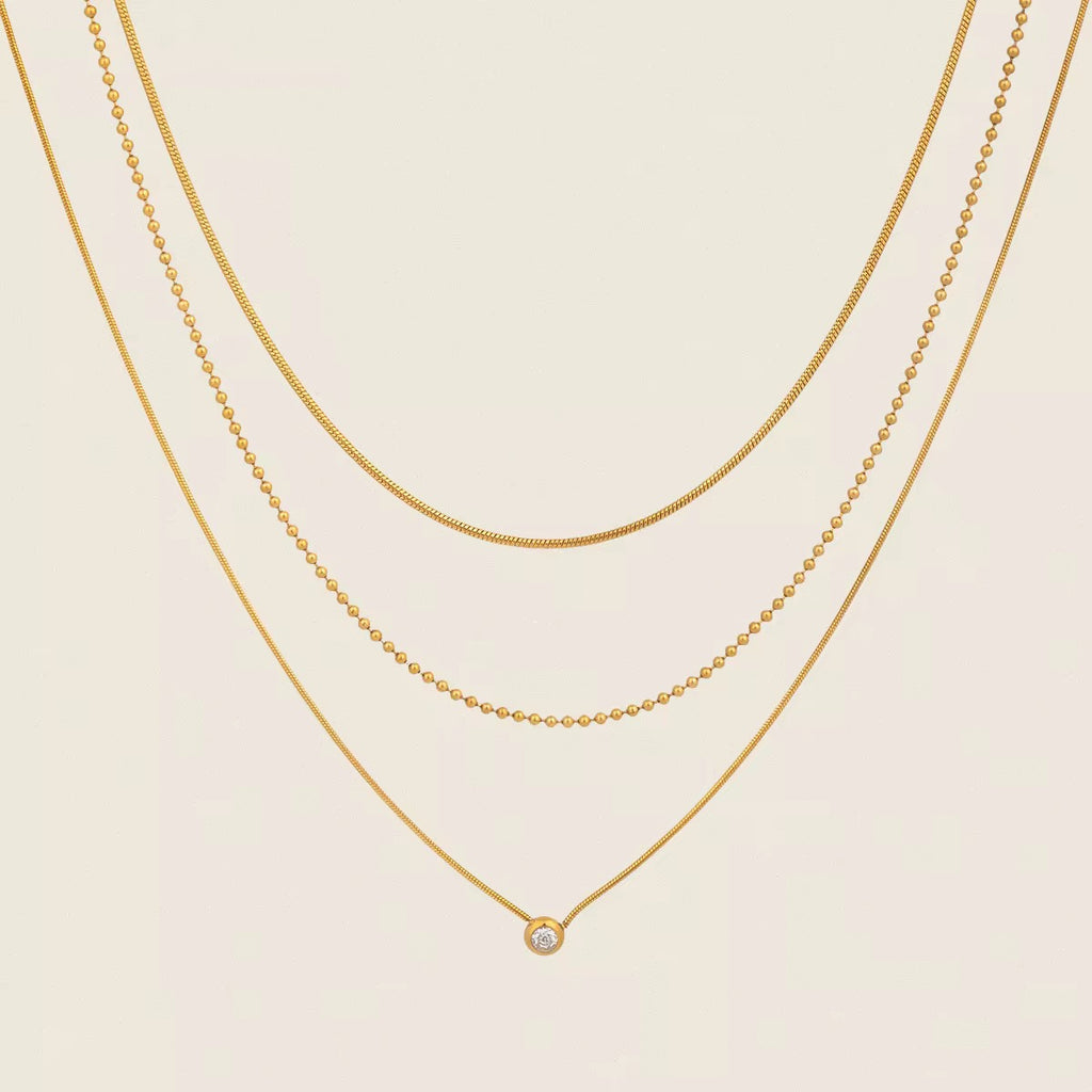 Tarnish-free ocean-proof Gilded Trio necklace safe for salt water and beach wear.
