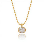 Detail of the secure gold bezel setting on a large round brilliant-cut crystal.