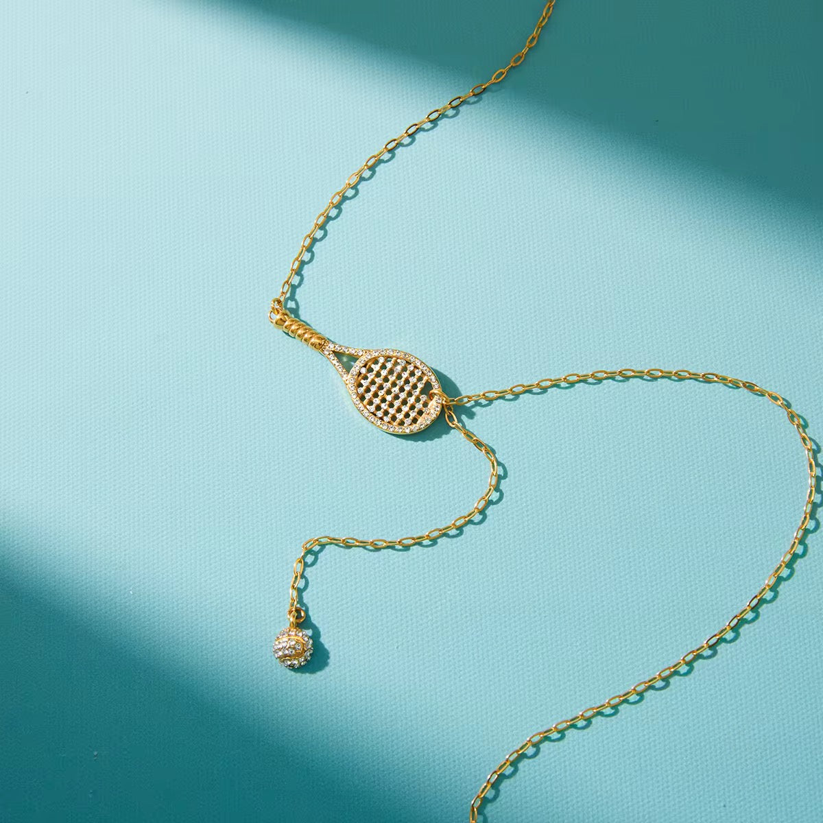 Hypoallergenic 18k gold plated stainless steel lariat for sensitive skin and daily wear.