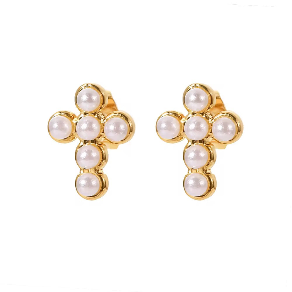 Non-tarnish 18k gold plated cross earrings with a 1-year anti-tarnish warranty.