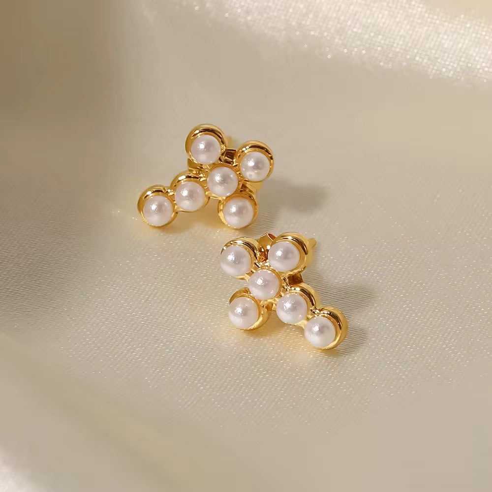 Hypoallergenic 18k gold plated stainless steel cross studs for sensitive ears.