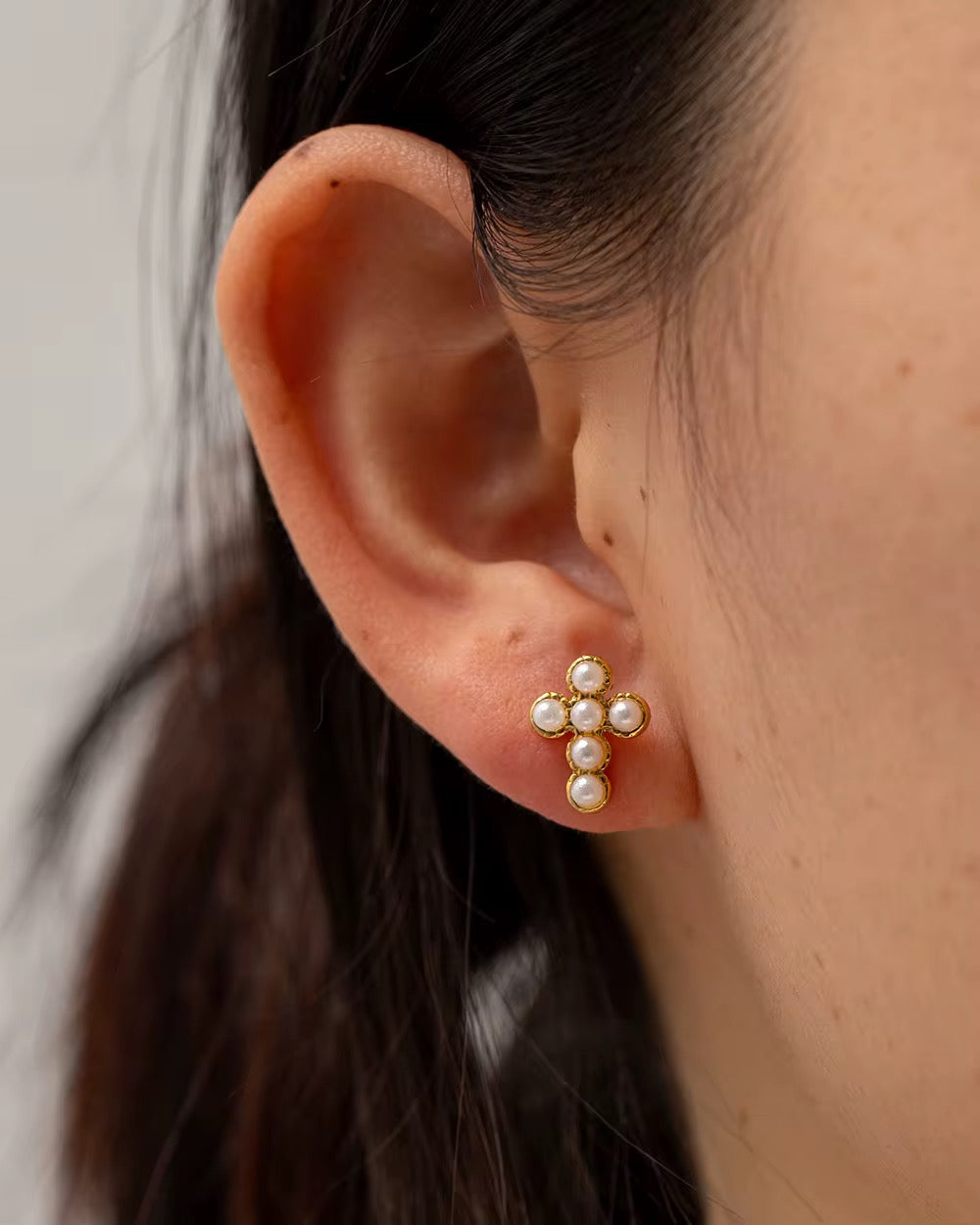 Pearl Cross Studs featuring 18k gold PVD plated stainless steel and pearls.