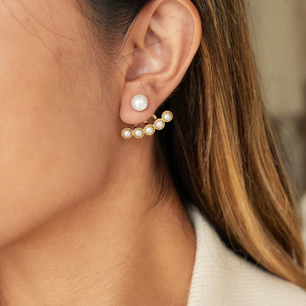 Waterproof gold pearl ear jackets for swimming and active daily lifestyles.
