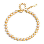 Waterproof gold pearl bracelet for swimming and active daily wear.