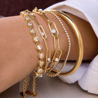 Tarnish-free ocean-proof gold bracelet safe for salt water and beach wear.