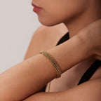 Waterproof gold watch strap chain bracelet for swimming and active daily wear.