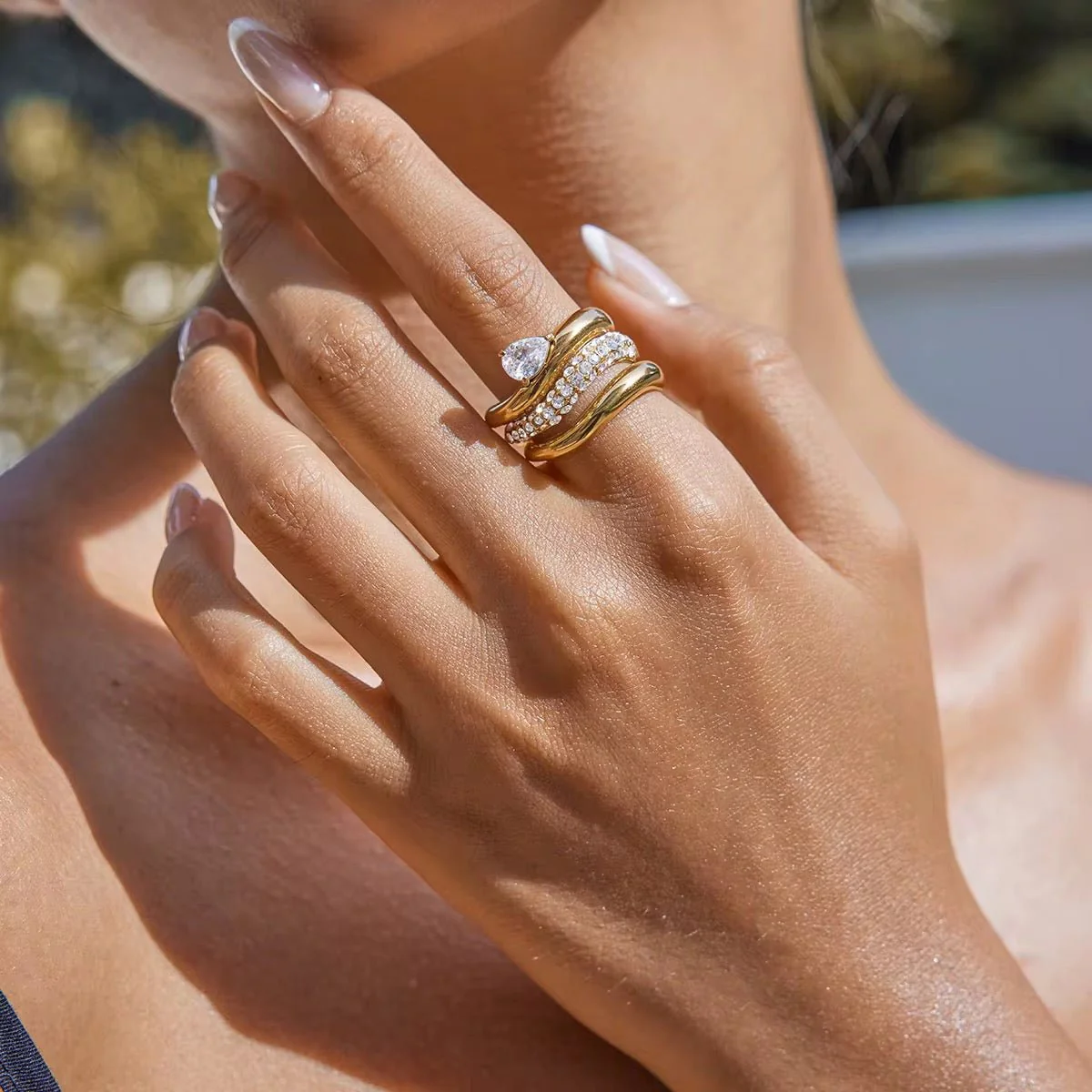 Hypoallergenic 18k gold plated cross-over wrap ring safe for ultra-sensitive skin types.
