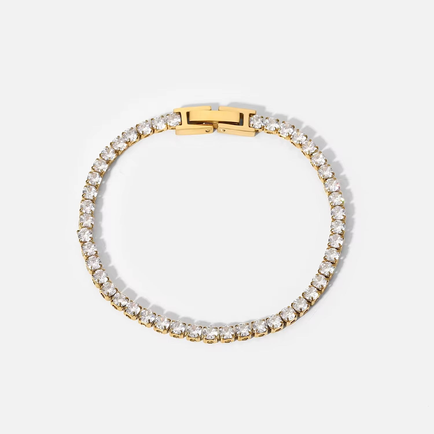 Hypoallergenic 18k gold plated classic crystal strand bracelet safe for sensitive skin types.