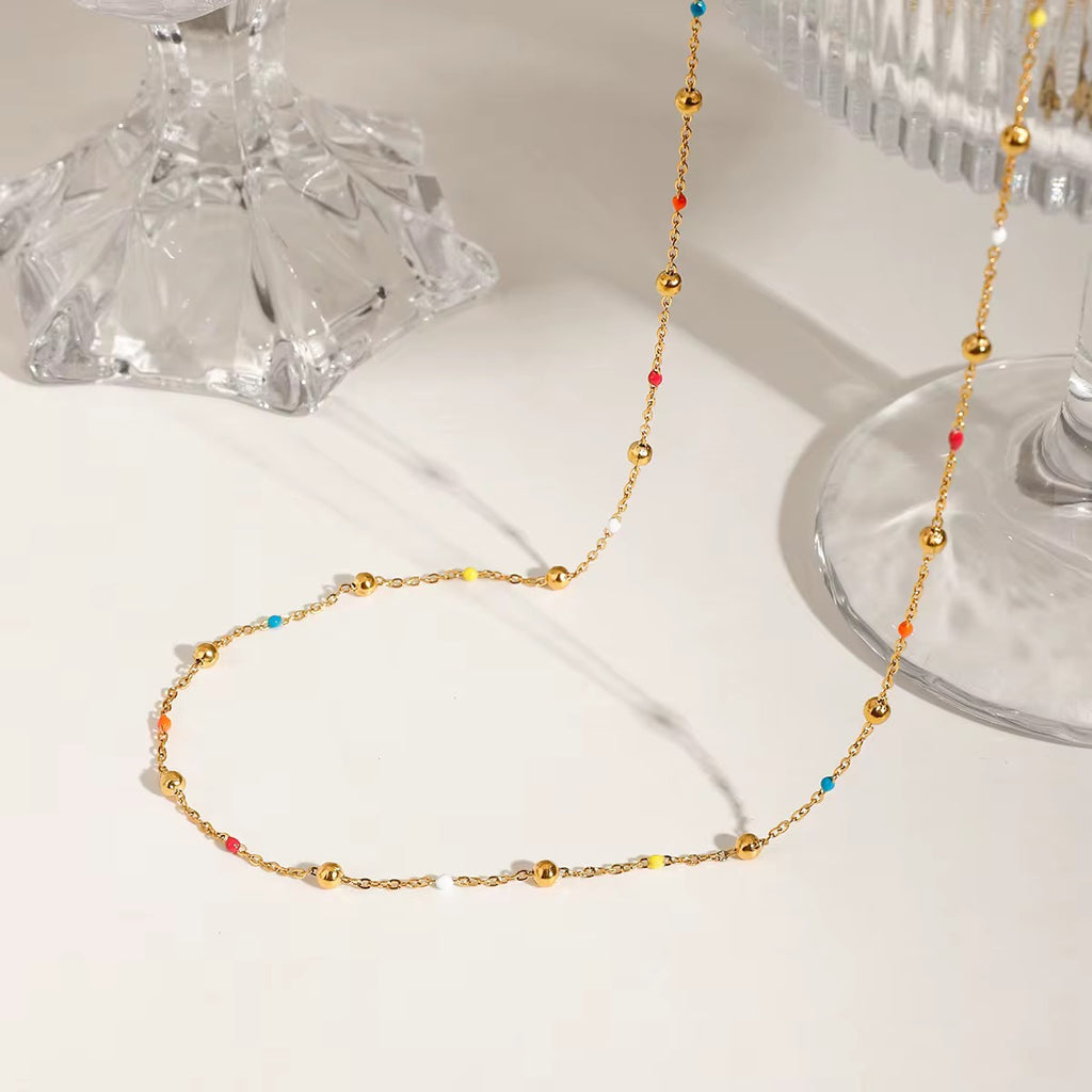 Hypoallergenic 18k gold plated dainty beaded necklace safe for sensitive skin types.