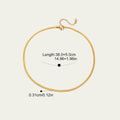 Detail of the secure gold lobster clasp and 5cm extender chain on a herringbone necklace.