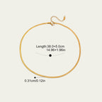 Detail of the secure gold lobster clasp and 5cm extender chain on a herringbone necklace.