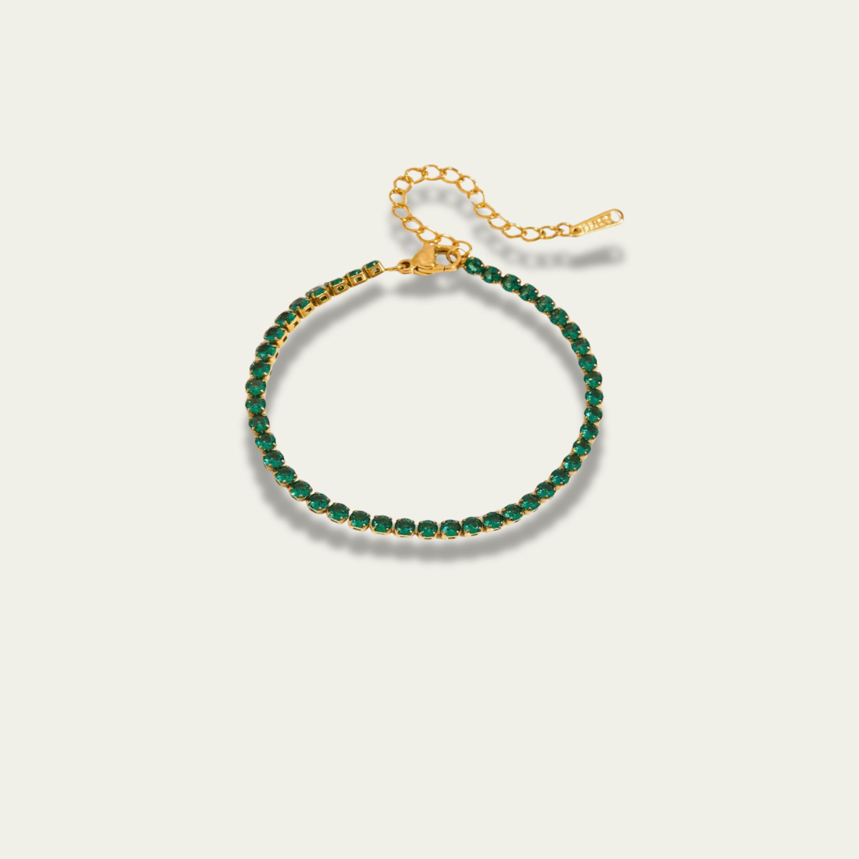 Waterproof Emerald Theory gold bracelet with 0.30cm emerald green crystals.