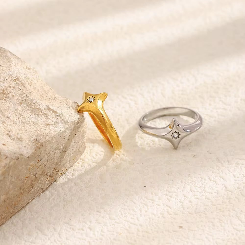 Celestial North Star ring set in 18k gold PVD plated stainless steel and polished silver.