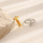Celestial North Star ring set in 18k gold PVD plated stainless steel and polished silver.