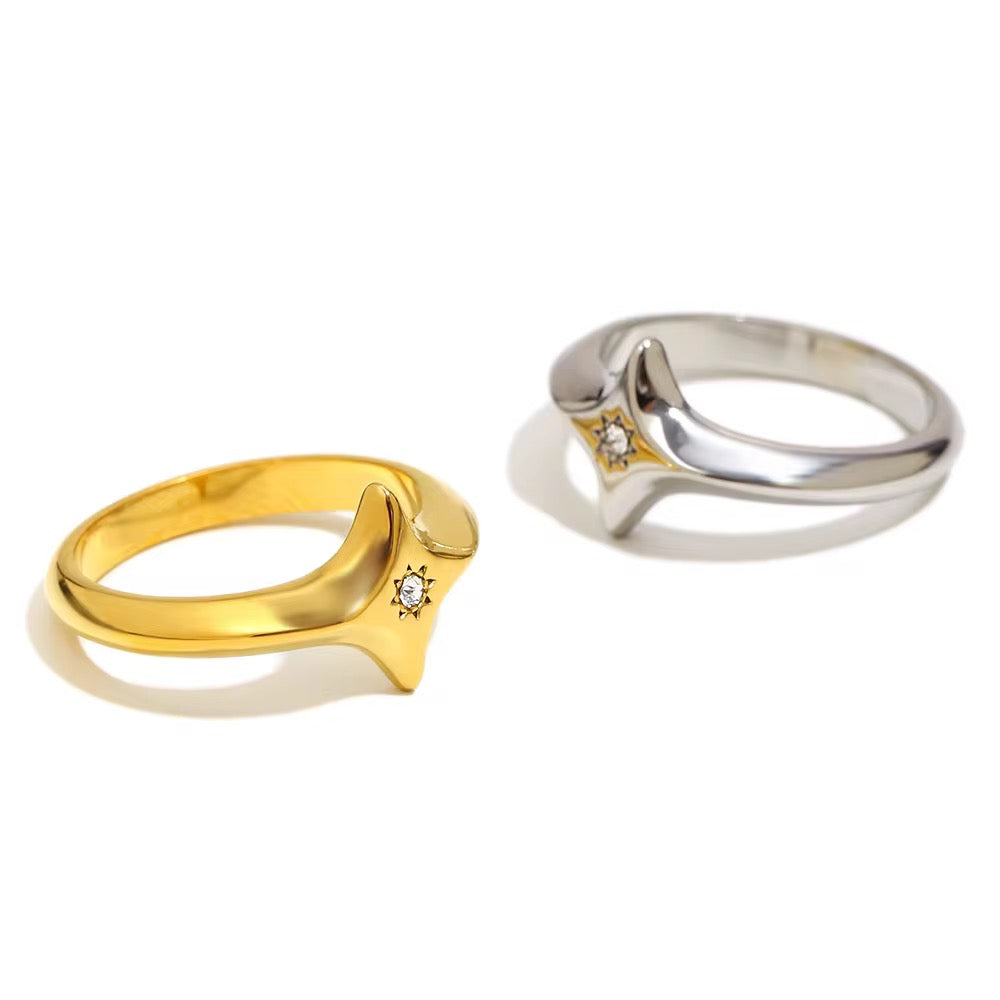 Tarnish-free silver North Star ring showing thick sculptural band on clean white background.