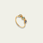 Premium everyday lifestyle jewelry showcasing slim gold gemstone bands in metric sizes L N P.