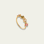 Close-up shot of gold PVD plated ring emphasizing secure prong settings on colorful crystals.