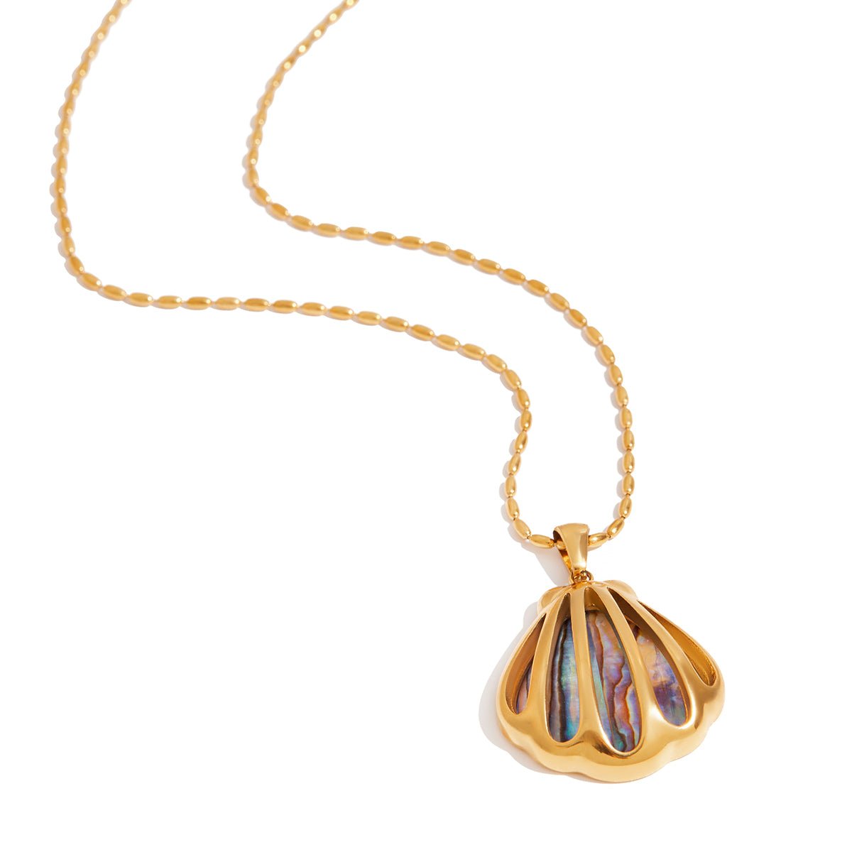 Gold necklace with a colorful pendant on a white background