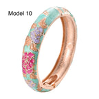 Luxury mint green bangle with pink and white floral enamel decoration