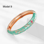 Handcrafted enamel bangle in teal with gold peony outlines