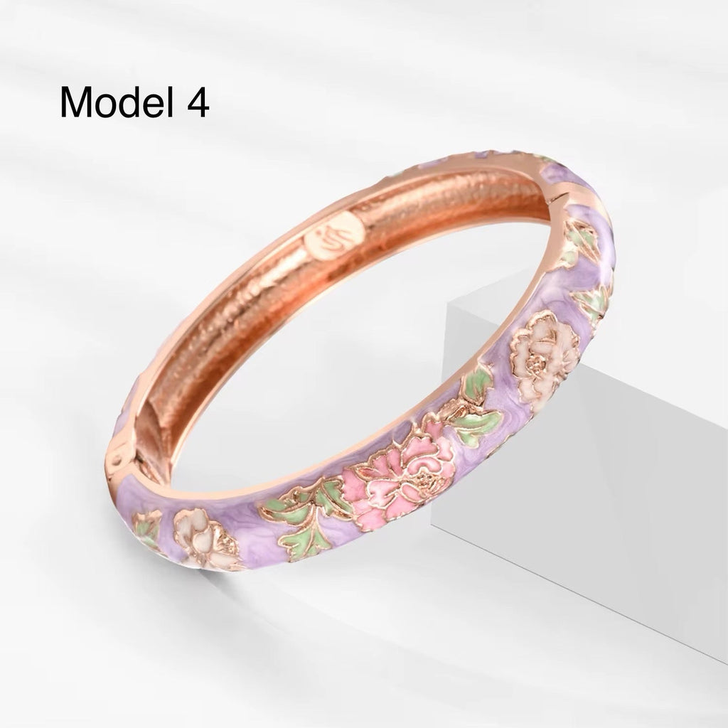 Elegant gold-plated enamel bangle with red magnolia flowers