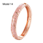 Turquoise floral bracelet with vivid painted petals and gold overlay