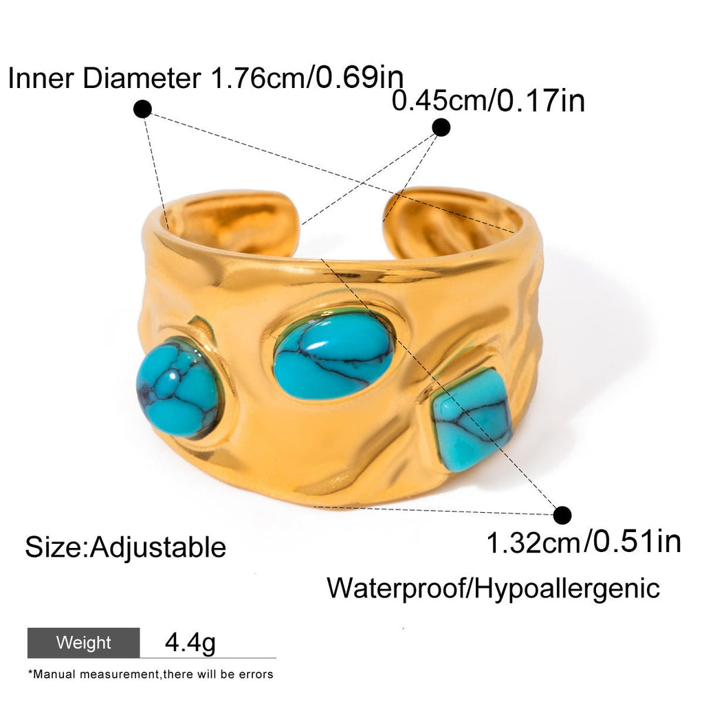 Gold bracelet with turquoise stones and measurement details on a white background