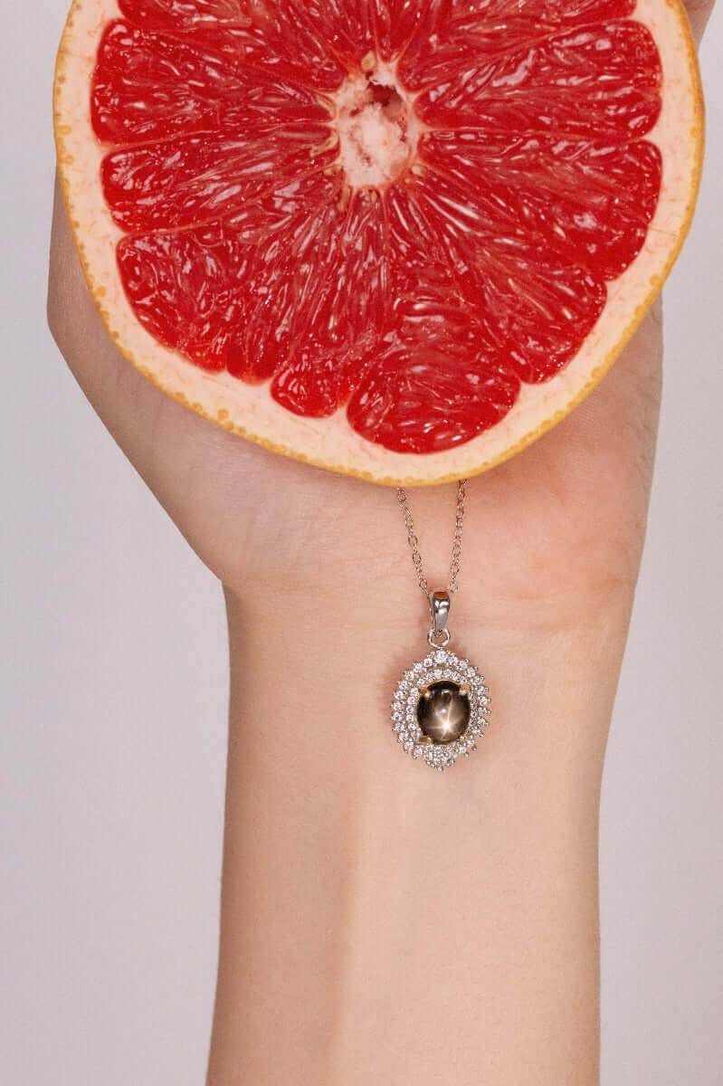 Natural star sapphire necklace with zirconia halo