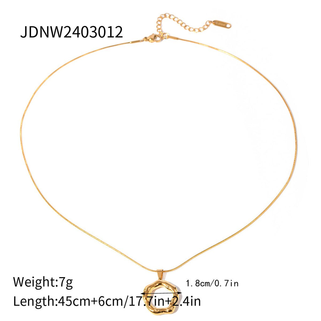Gold necklace with a circular pendant on a white background, showing weight, length, and chain details.