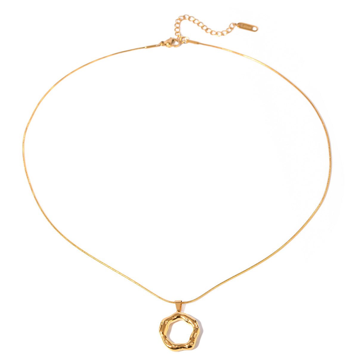 Gold necklace with a unique pendant on a white background
