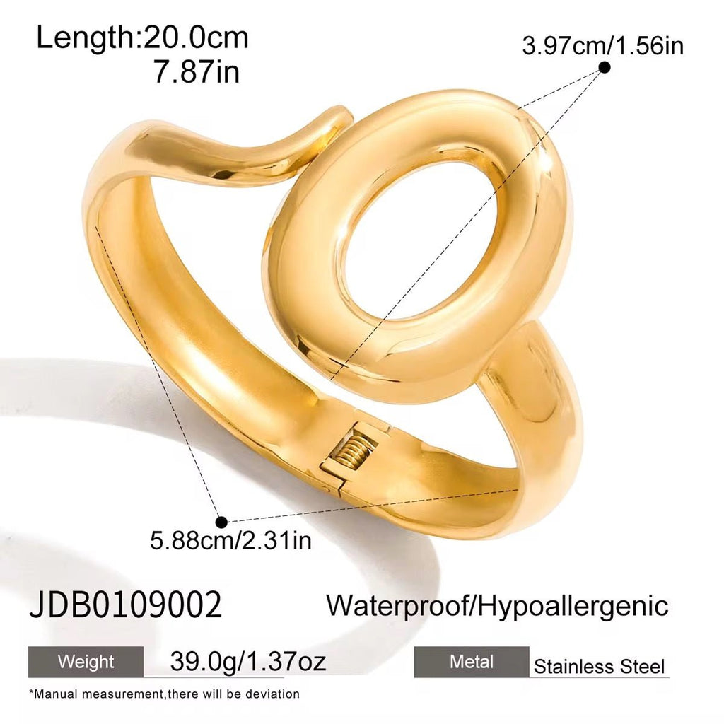 Gold ring with measurements and product details on a white background