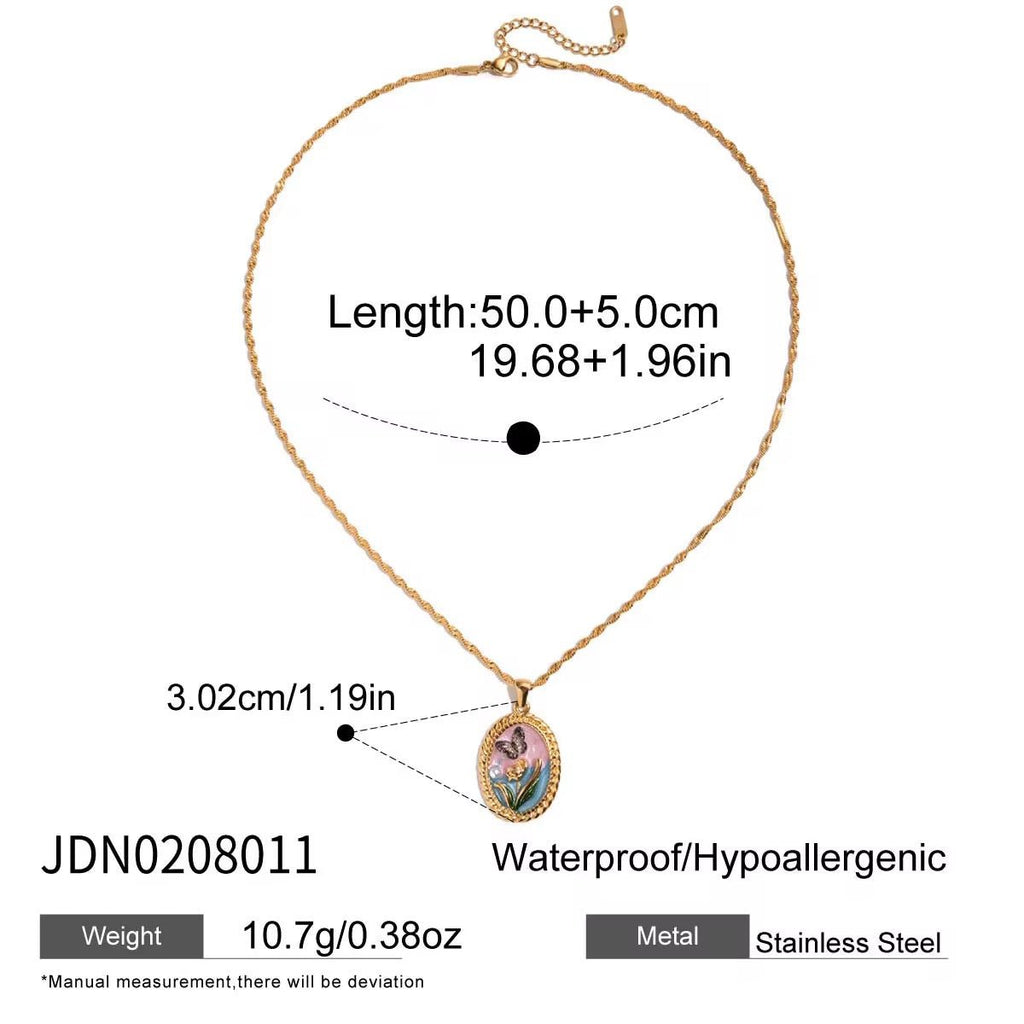 Gold necklace with pendant, measurements, and material details on a white background