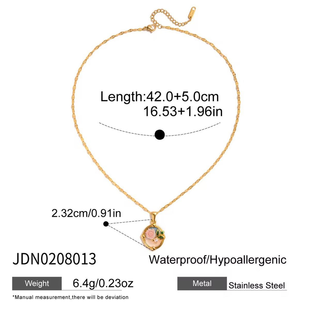 Gold necklace with pendant, measurements, and material details on a white background