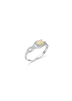 Handmade white opal ring in platinum-plated silver